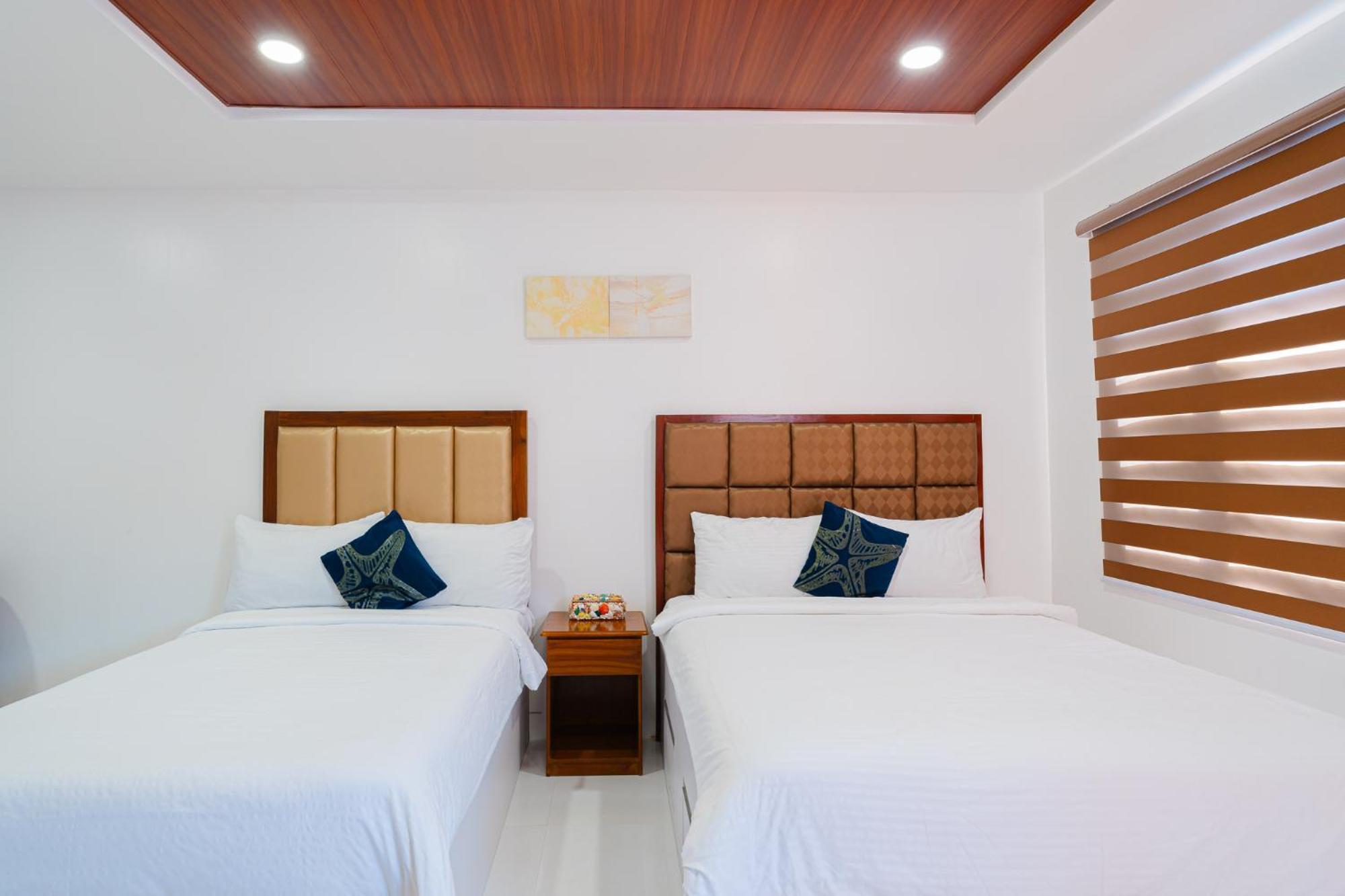 Q Beach Resort Cabangan Exterior photo